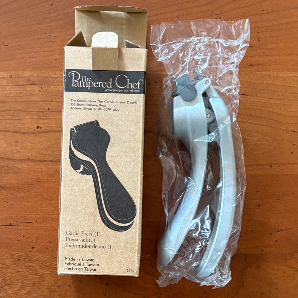 The Pampered Chef Garlic Press